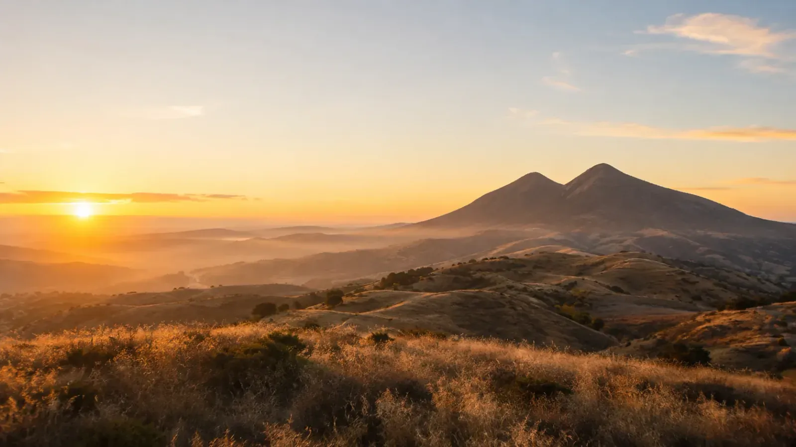 Sunrise over the twin peaks near Double Peak Recovery